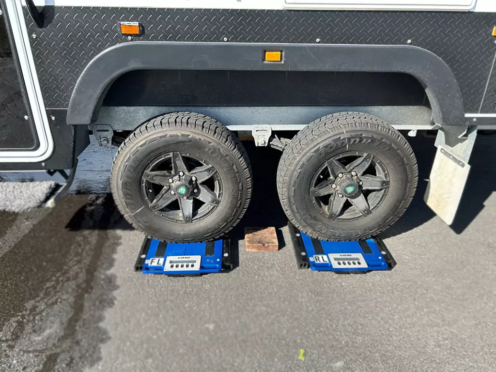 Close up of two wheels on scales