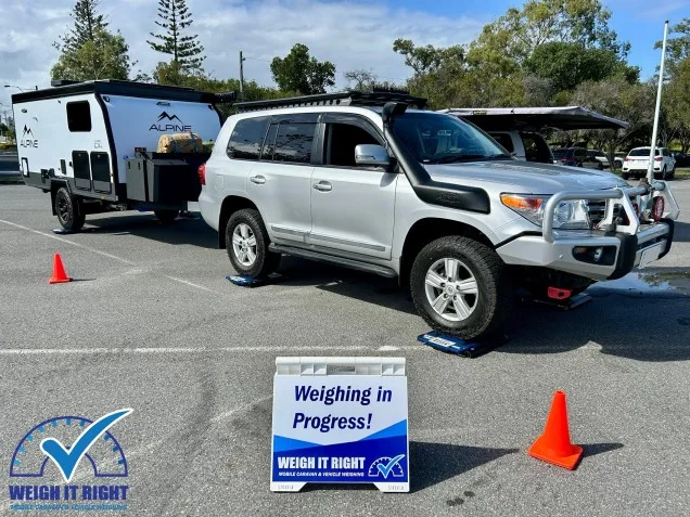 Car and campervan being weighed